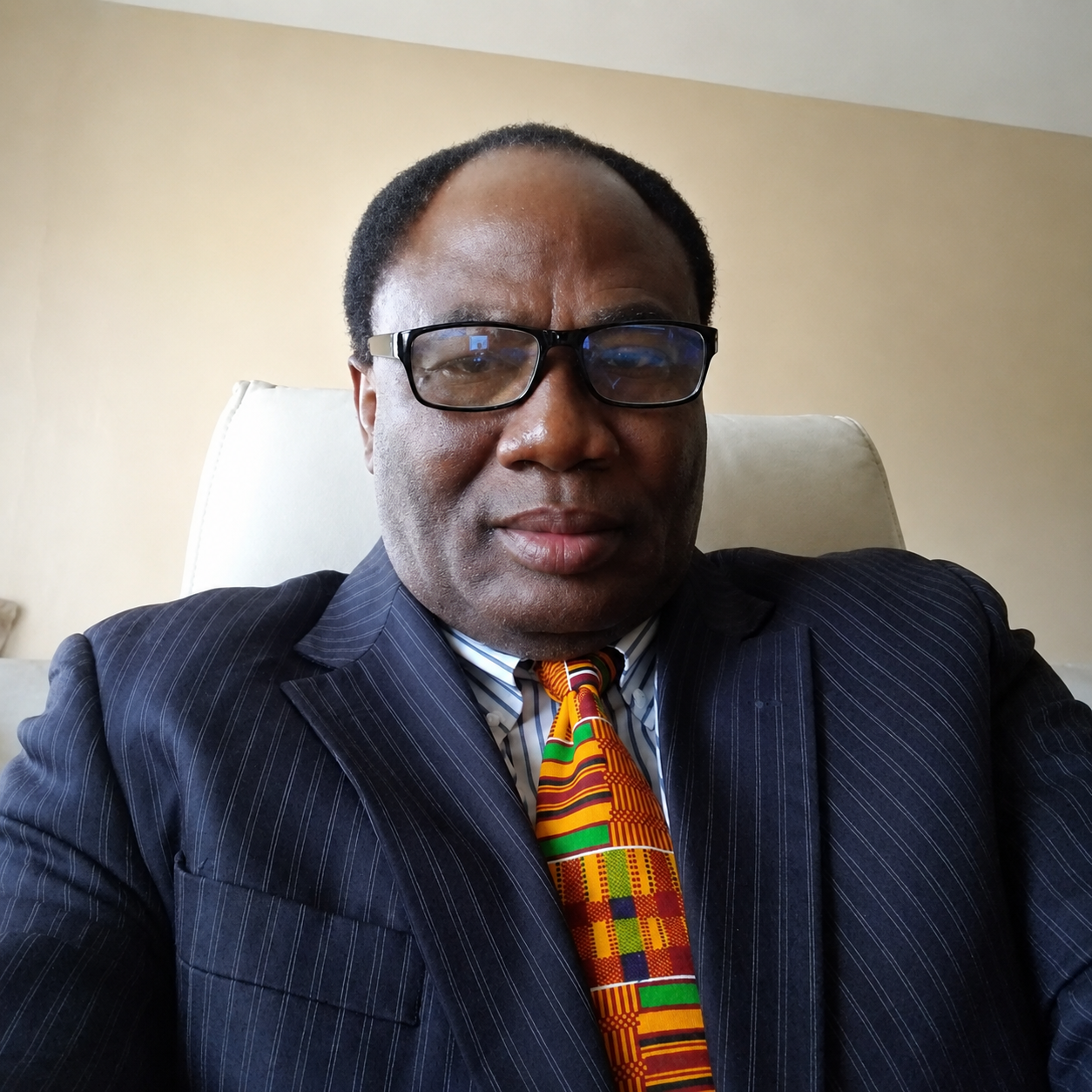 Dr. Gilbert  Adjoyi
